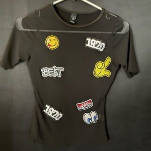 Opaque (sheer) T-shirt with fashion patches
